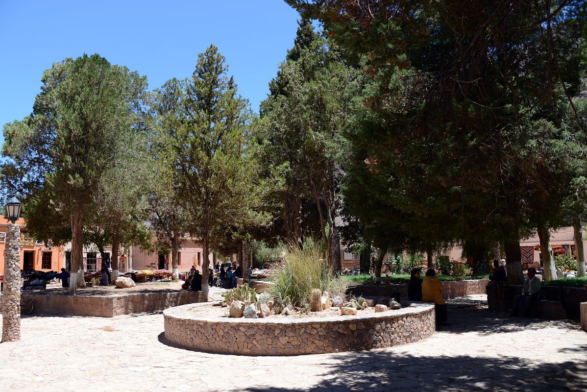 08 Locals Relaxing in the Shade Of The Main Square Plaza 9 de Julio in Purmamarca